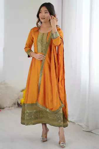 Mustard women elegant blooming vichitra gown with jacquard lace border dupatta | party wear ethnic gown |