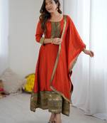 Orange women elegant blooming vichitra gown with jacquard lace border dupatta | party wear ethnic gown |