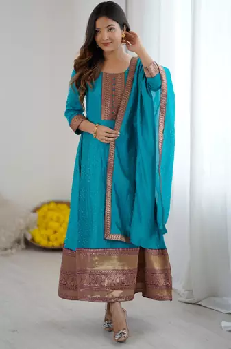 Sky blue women elegant blooming vichitra gown with jacquard lace border dupatta | party wear ethnic gown |