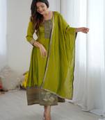 Green women elegant blooming vichitra gown with jacquard lace border dupatta | party wear ethnic gown |