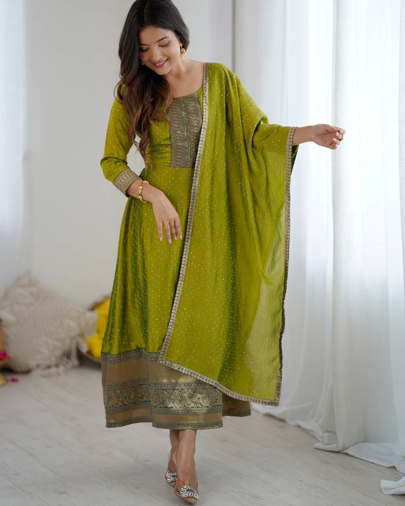 Green women elegant blooming vichitra gown with jacquard lace border dupatta | party wear ethnic gown |