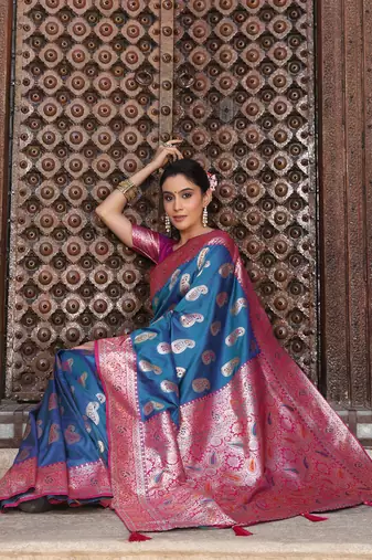 sky blue banarasi silk blend saree with woven paisley butti