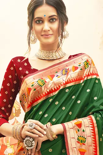 majestic dark green paithani silk blend saree with royal floral zari pallu 