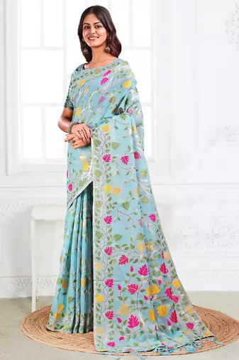 sky blue linen saree with woven multicolor leaf print