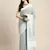 Sutriti women teal green & silver-toned woven design linen blend saree