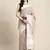 Sutriti women beige & silver-toned woven design linen blend saree