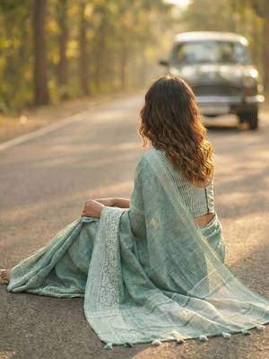 women teal green & silver-toned woven design linen blend saree 2