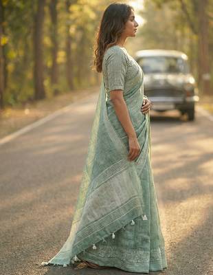 women teal green & silver-toned woven design linen blend saree 3
