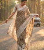 Sutriti women beige & silver-toned woven design linen blend saree