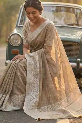 women beige & silver-toned woven design linen blend saree