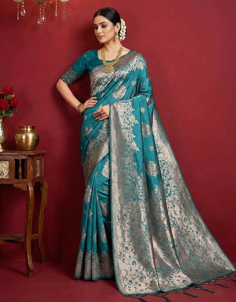 Sutriti peacock green soft silk saree with intricate silver weaving