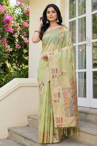 Sutriti pista green woven linen saree with artistic pallu & tassels | elegant traditional wear