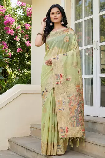 Sutriti pista green woven linen saree with artistic pallu & tassels | elegant traditional wear
