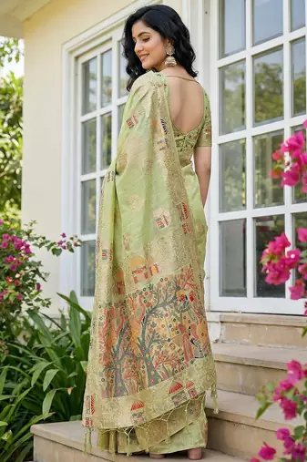 pista green woven linen saree with artistic pallu & tassels 
