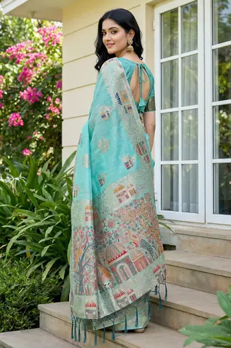 sea green woven linen saree with artistic pallu & tassels 