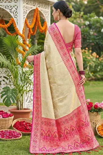 elegant cream & hot pink art silk blend kanjivaram style saree with rich zari border & paisley pallu