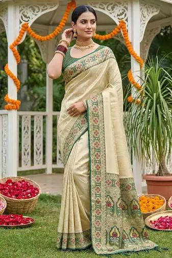 Sutriti elegant cream & green art silk kanjivaram style saree with rich zari border & paisley pallu
