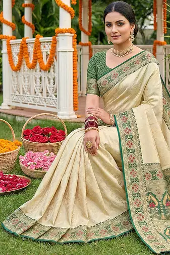 elegant cream & green art silk blend kanjivaram style saree with rich zari border & paisley pallu