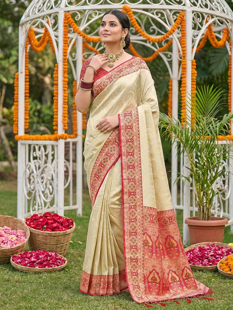 Sutriti elegant cream & red art silk kanjivaram style saree with rich zari border & paisley pallu