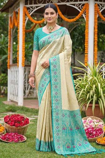 Sutriti elegant cream & turquoise art silk kanjivaram style saree with rich zari border & paisley pallu