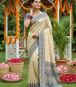 Sutriti elegant cream & teal art silk kanjivaram style saree with rich zari border & paisley pallu