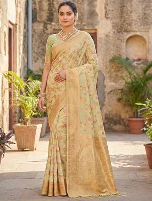 light green banarasi silk blend saree with golden zari woven border 1