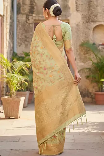 light green banarasi silk blend saree with golden zari woven border