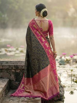 women black soft silk blend saree with pink nandi zari temple border 3