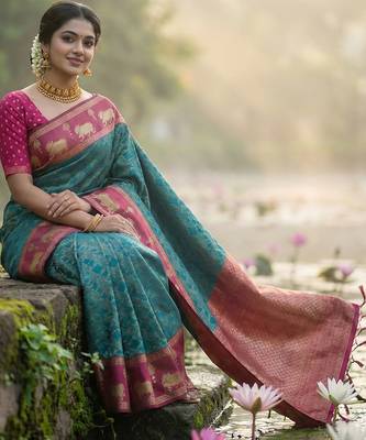 women teal blue soft silk blend saree with pink nandi zari border 2