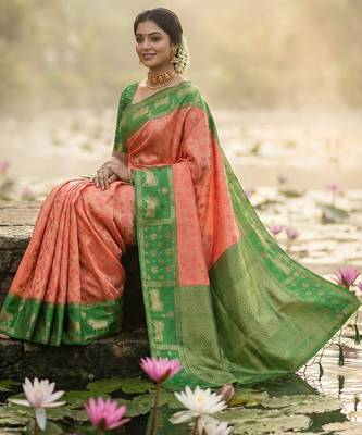 women peach soft silk blend saree with green nandi zari border 2