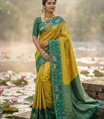 Sutriti women yellow soft silk saree with green nandi zari border