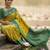 Sutriti women yellow soft silk saree with green nandi zari border