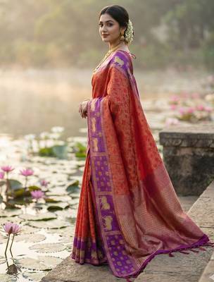 women rust orange soft silk blend saree with purple nandi zari border 4