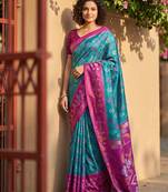 Sutriti sky blue & magenta pochampalli soft silk saree with traditional ikat pallu sari