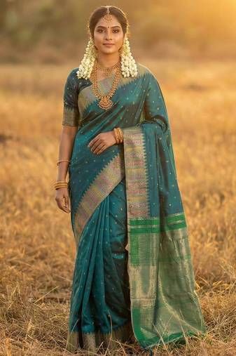 Sutriti bottle green zari woven banarasi style semi-silk saree | elegant temple wear with rich pallu & blouse