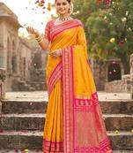 Sutriti graceful yellow banarasi silk saree with golden zari woven border & floral jaal – wedding & festive wear