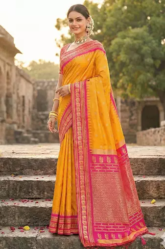yellow banarasi silk blend saree with golden zari woven border