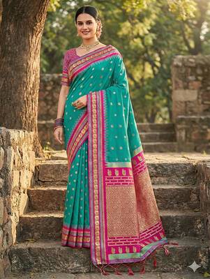 sea green banarasi silk blend saree with golden zari woven border 1