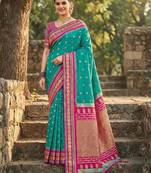 Sutriti graceful sea green banarasi silk saree with golden zari woven border & floral jaal     wedding & festive wear