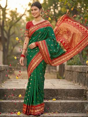 green banarasi silk blend saree with golden zari woven border 1
