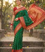 Sutriti graceful green banarasi silk saree with golden zari woven border & floral jaal     wedding & festive wear