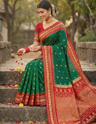 green banarasi silk blend saree with golden zari woven border 4