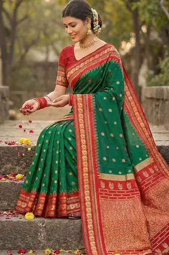 Sutriti graceful green banarasi silk saree with golden zari woven border & floral jaal     wedding & festive wear