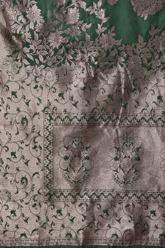 emerald green soft silk blend saree with heavy silver zari weaving