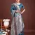 Sutriti ocean teal blue floral woven soft silk saree