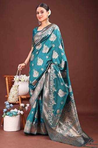 Sutriti peacock green soft silk saree with intricate silver weaving