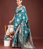 Sutriti peacock green soft silk saree with intricate silver weaving