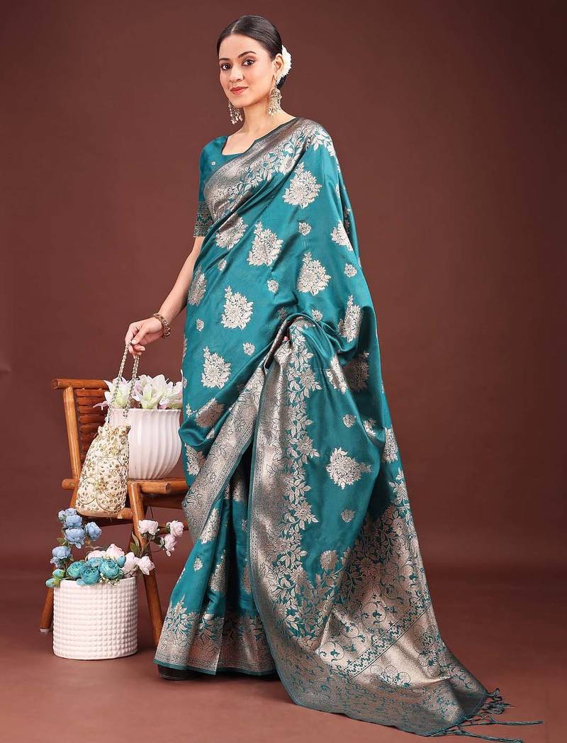 Sutriti peacock green soft silk saree with intricate silver weaving