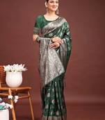 Sutriti forest green woven soft silk saree with rich silver zari