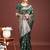 Sutriti forest green woven soft silk saree with rich silver zari